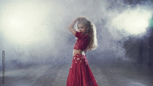 Caucasian children girl dancing belly dance