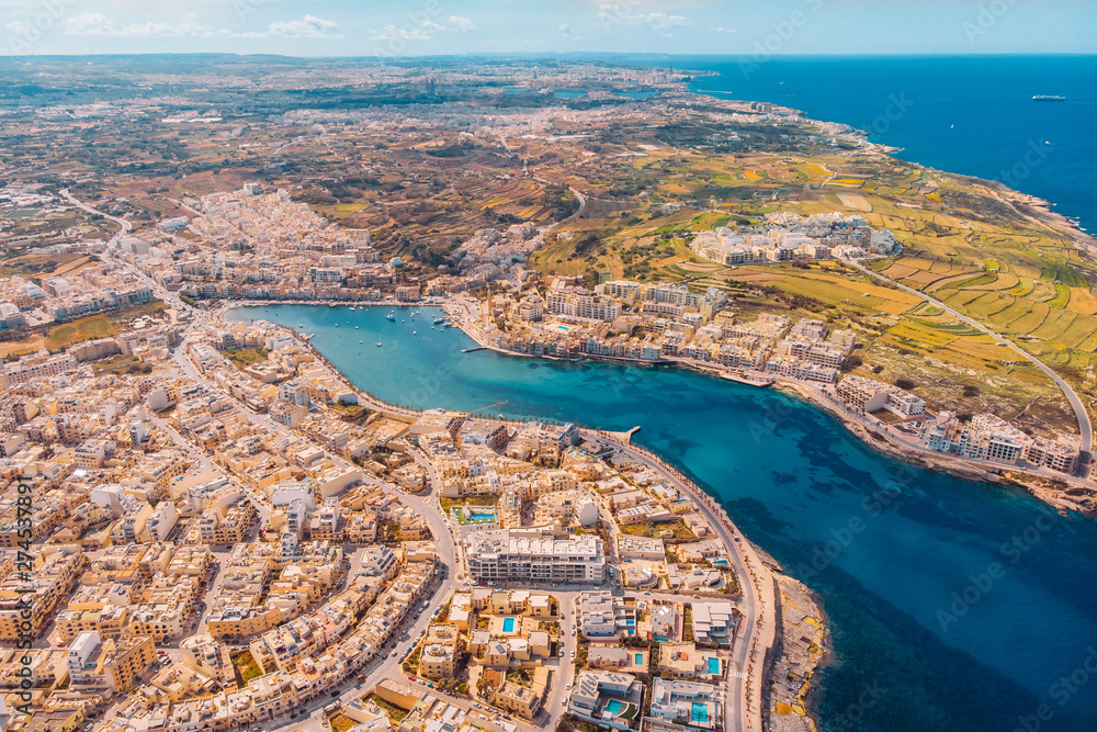 City Marsaskala Malta summer harbour water mediterranean sea blue. Aerial top view
