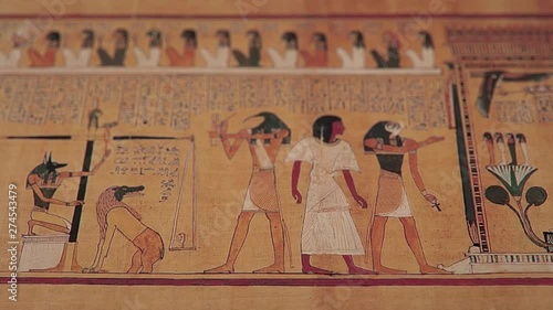 Hunefer's Book Of The Dead, CGI of an ancient Egyptian papyrus paper, pan shot, shallow depth of field. photo