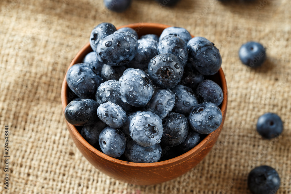 Fresh Blueberries in Bowl. Healthy diet vegetarian food. Top view. Fresh Blueberries in Bowl. Healthy diet vegetarian food. Top view.
