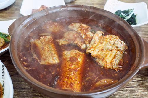 A hot pot of spicy soy sauce and braised cutlass fish famous in Jeju Island, South Korea.