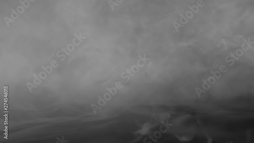 Abstract smoke steam moves on a black background . The concept of aromatherapy