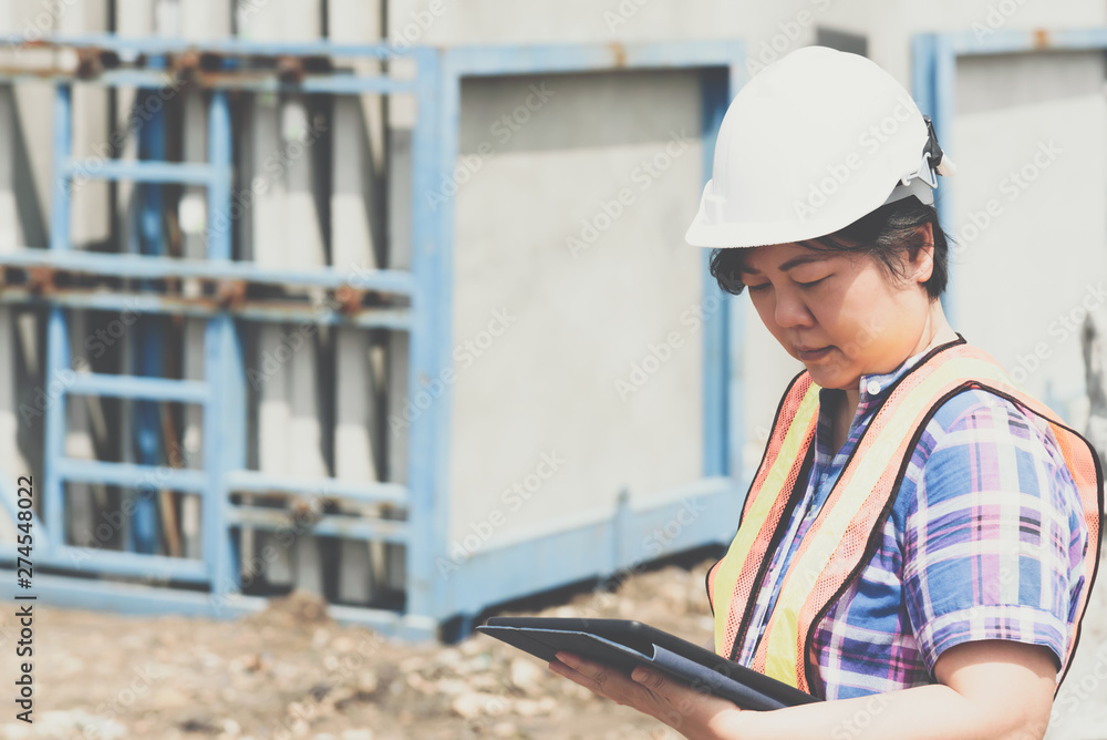 Woman construction engineer at construction site Woman construction engineer at construction site