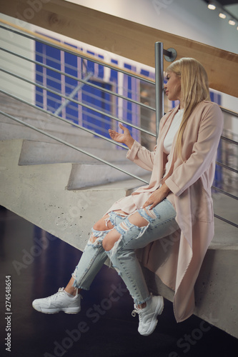 woman accros the city sky line photo