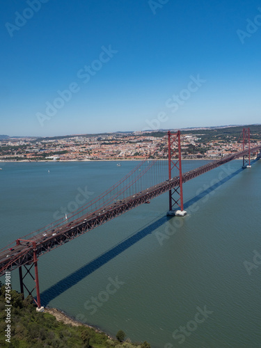 Portugal, may 2019: The 25 April bridge (Ponte 25 de Abril) is a steel suspension bridge located in Lisbon, crossing the Targus river. It is one of the most famous landmarks of the region.