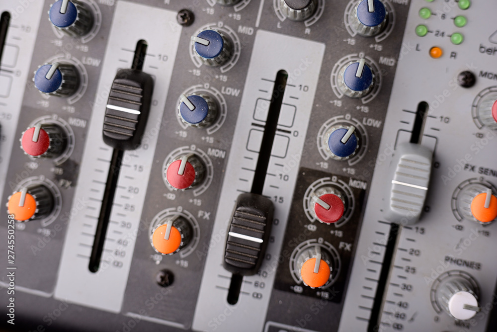 Close-up of modern digital sound mixer in a sound recording studio Close-up of modern digital sound mixer in a sound recording studio