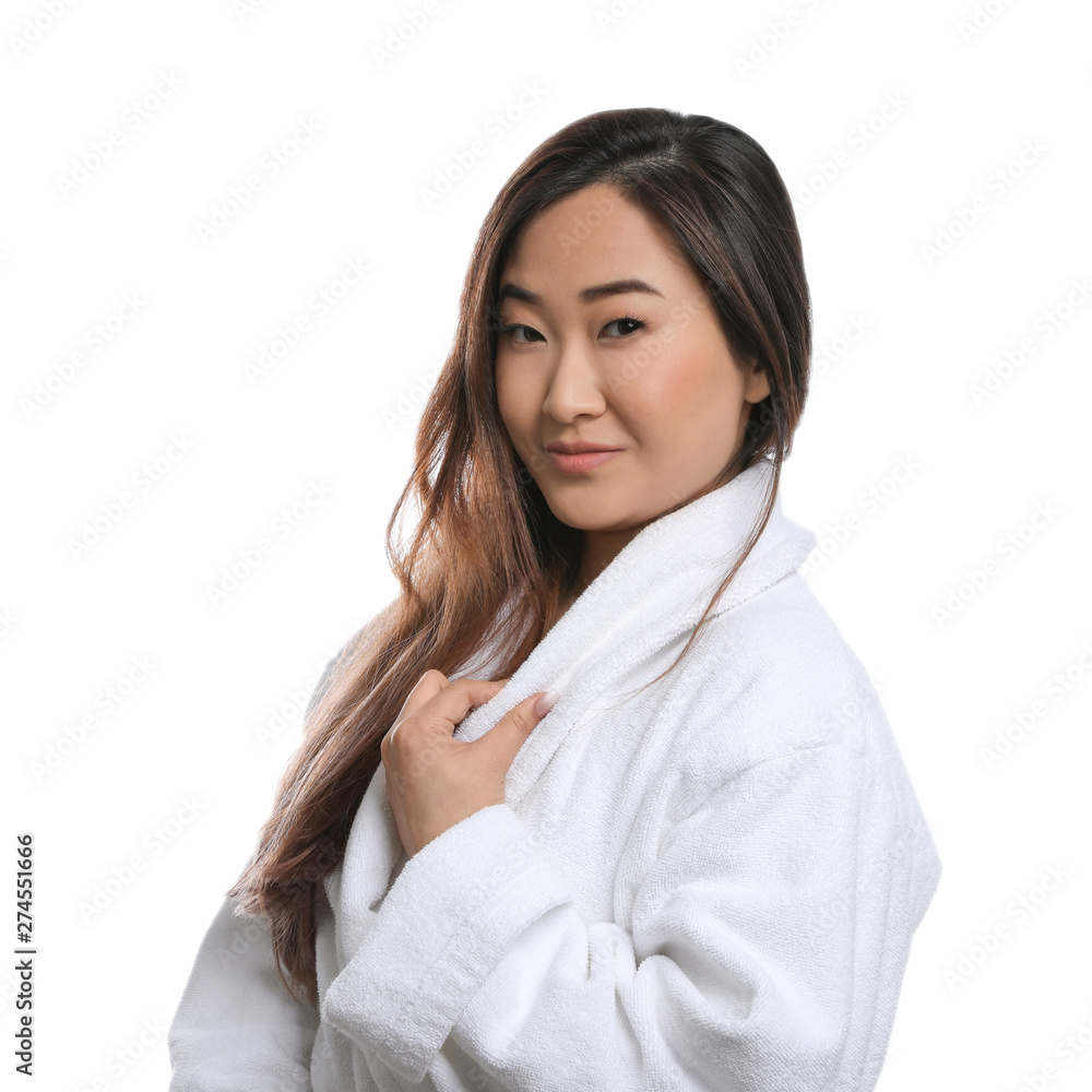 Portrait of beautiful Asian woman in bathrobe isolated on white. Spa treatment Portrait of beautiful Asian woman in bathrobe isolated on white. Spa treatment