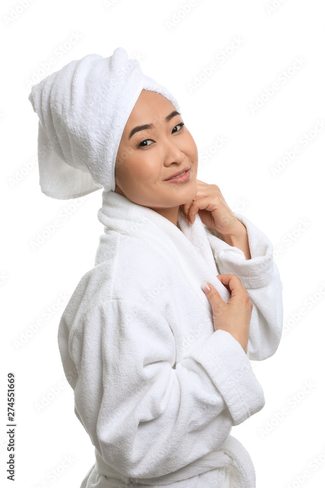 Portrait of beautiful Asian woman in bathrobe isolated on white. Spa treatment Portrait of beautiful Asian woman in bathrobe isolated on white. Spa treatment
