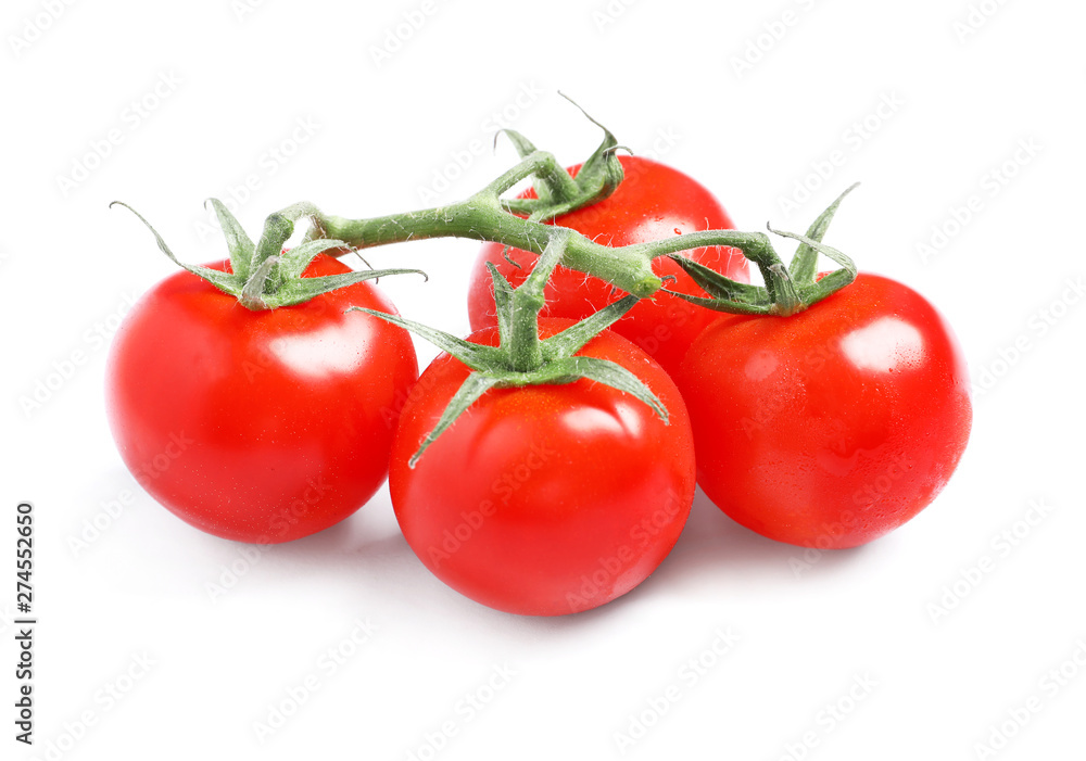 Branch of fresh cherry tomatoes isolated on white Branch of fresh cherry tomatoes isolated on white