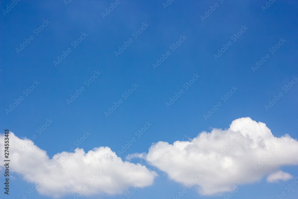 Blue sky with clouds on a bright day. Nature background Blue sky with clouds on a bright day. Nature background