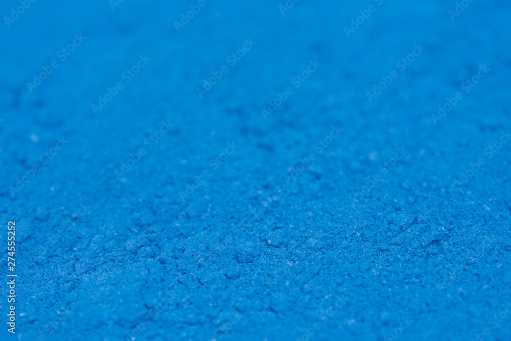 Obraz premium blue powder pigment art texture background