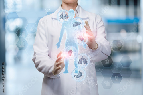 The doctor adjusts the health of the person .