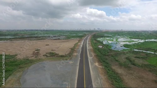 View of Hun Sen Boulevard, Cambodia. Inaugurated on 3rd April 2017, this highway named after the Prime minister connects Phnom Penh, the capital city, to Ta Khmau to the border of Kandal Province photo