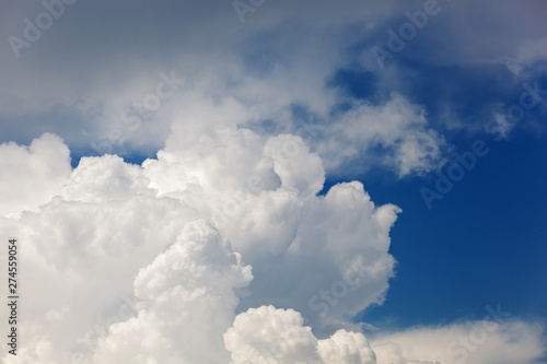 Clouds and bright blue sky background