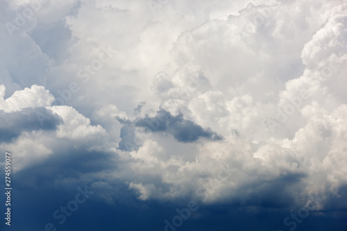 Clouds and bright blue sky background