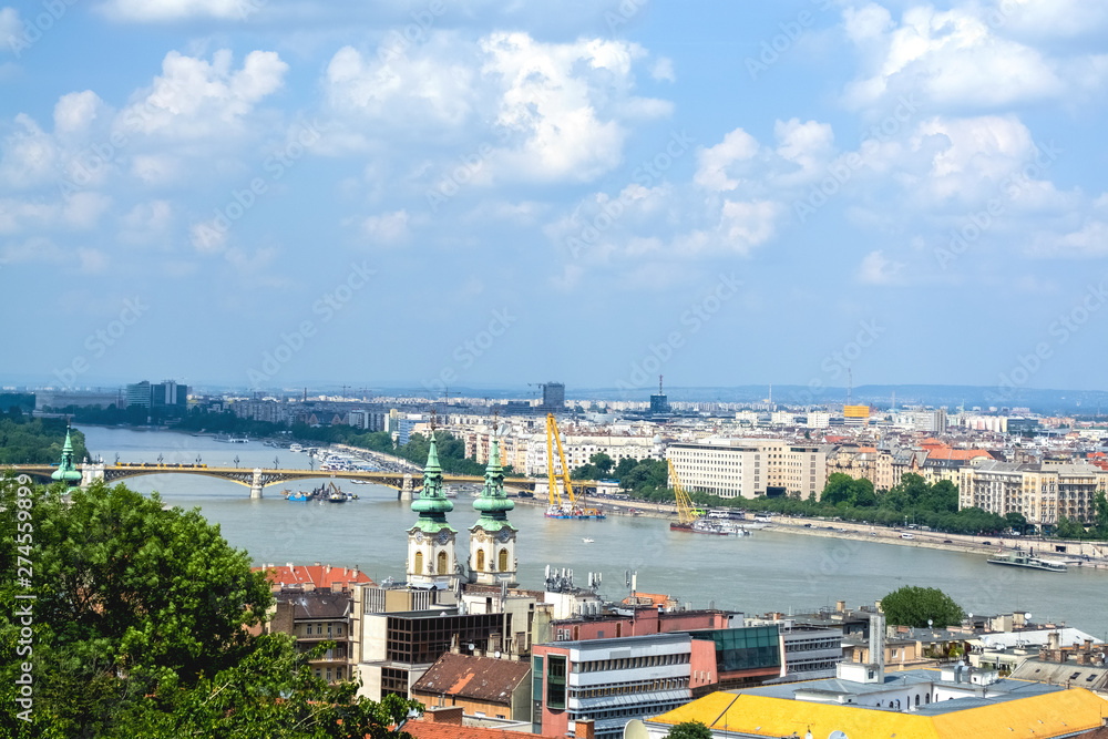 12.06.2019. Budapest, Hungary. Beautiful view of  historical part of the city, of old buildings and sights, river and coast, of transport.
