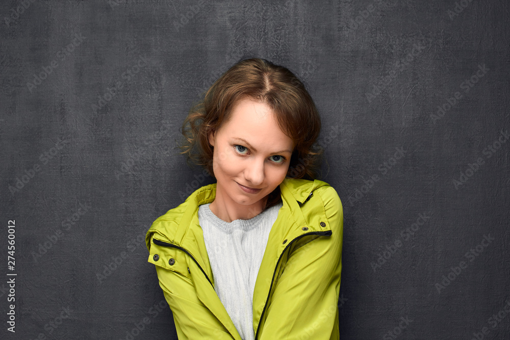 Obraz premium Portrait of cute girl making innocent face