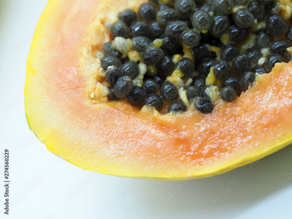 Φωτογραφία London, UK - June 2019 – Close Up Of Papaya Cut In Half With Seeds Displayed
