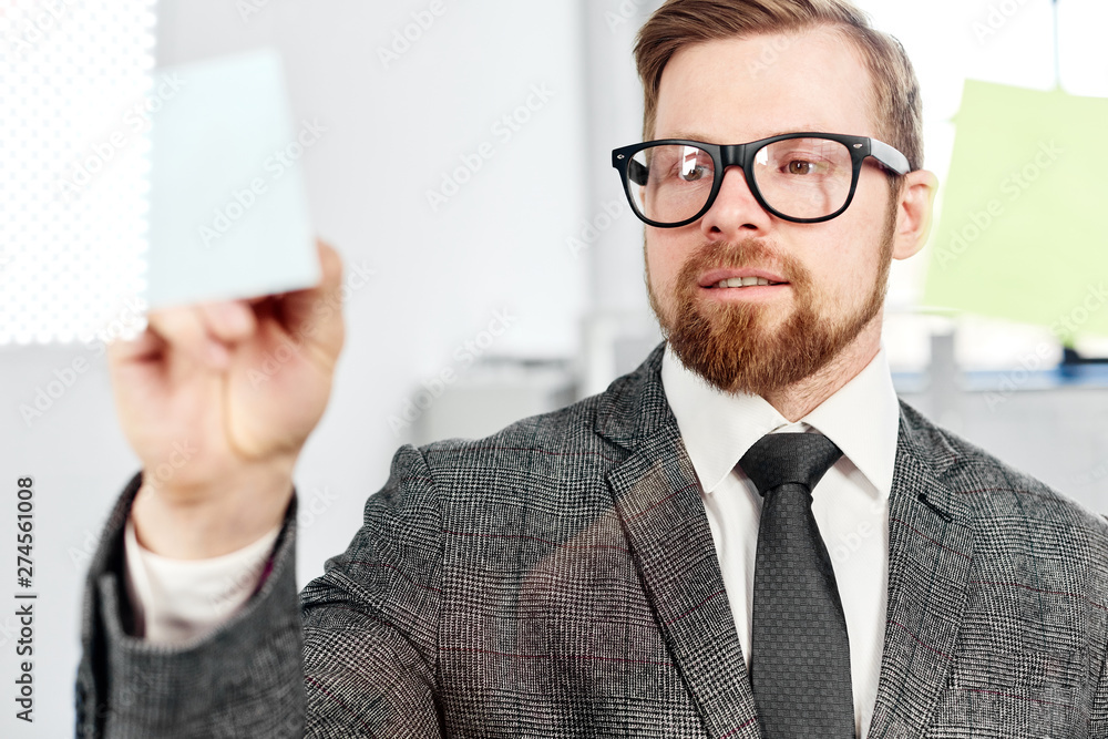 mid age businessman working on new project at modern office