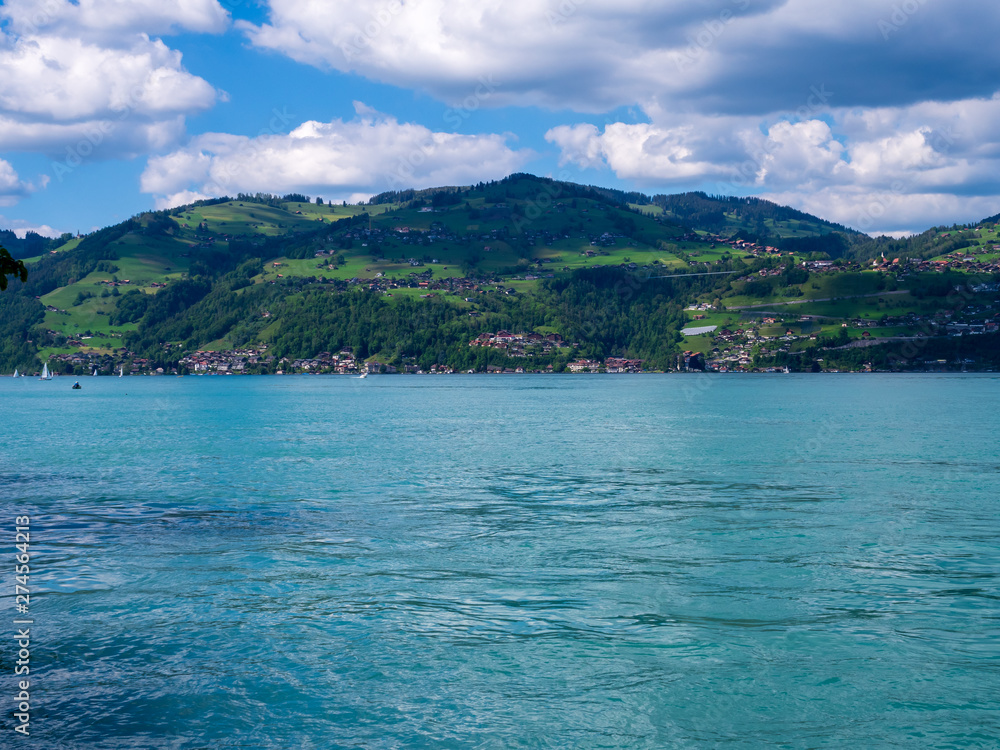 Spiez, Switzerland - May 30th 2019: Thun lake view from Spiez Ferry port.