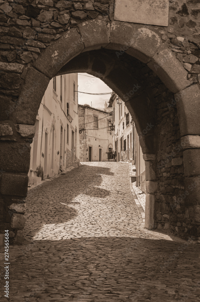 Arched door in stone wall at the Castle of Estremoz Arched door in stone wall at the Castle of Estremoz