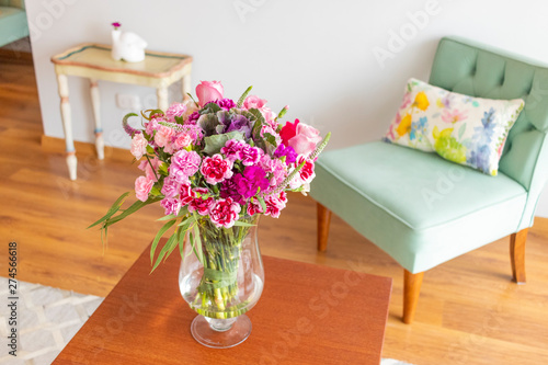 Wallpaper Mural Floral arrangement  of roses and carnations decorating the living room of the house Torontodigital.ca