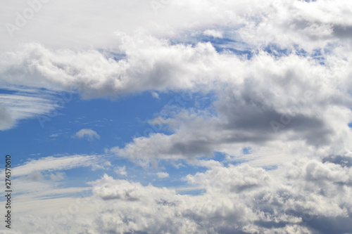 Cloudscape with a blue sky break in the clouds