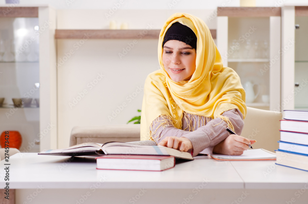 Female student in hijab preparing for exams Female student in hijab preparing for exams