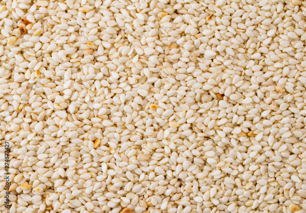 Sesame seeds, background. The view of the top. Sesame seeds, background. The view of the top.