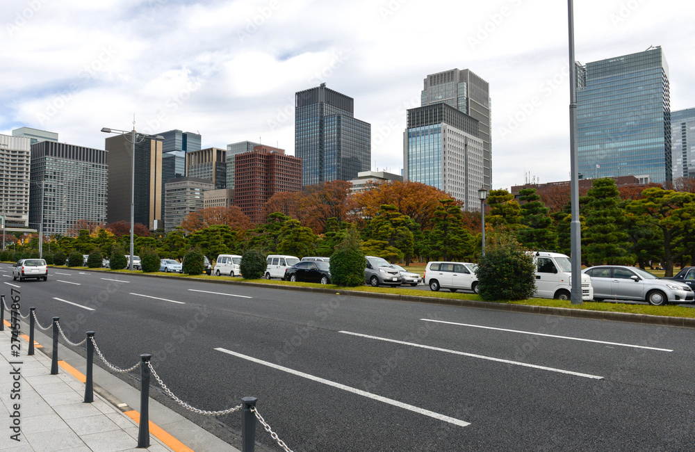 City scape of road with car and building in Japan