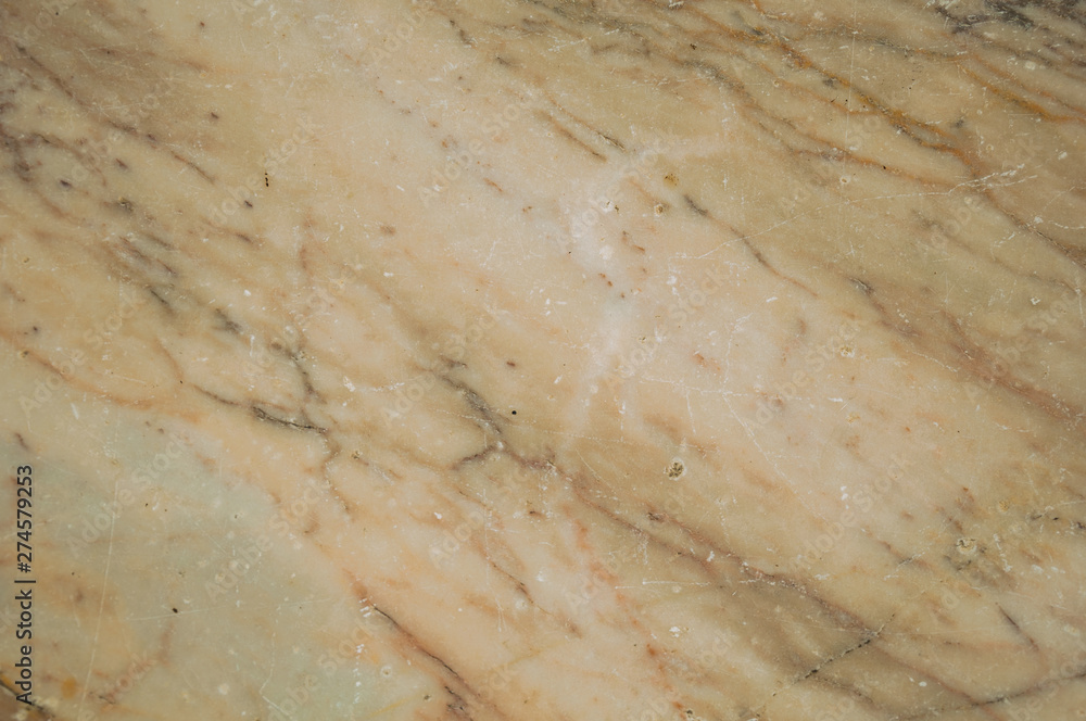 Marble surface with veins and some cracks and chipped