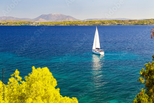 Konstfotografi White sail and  blue  sea.