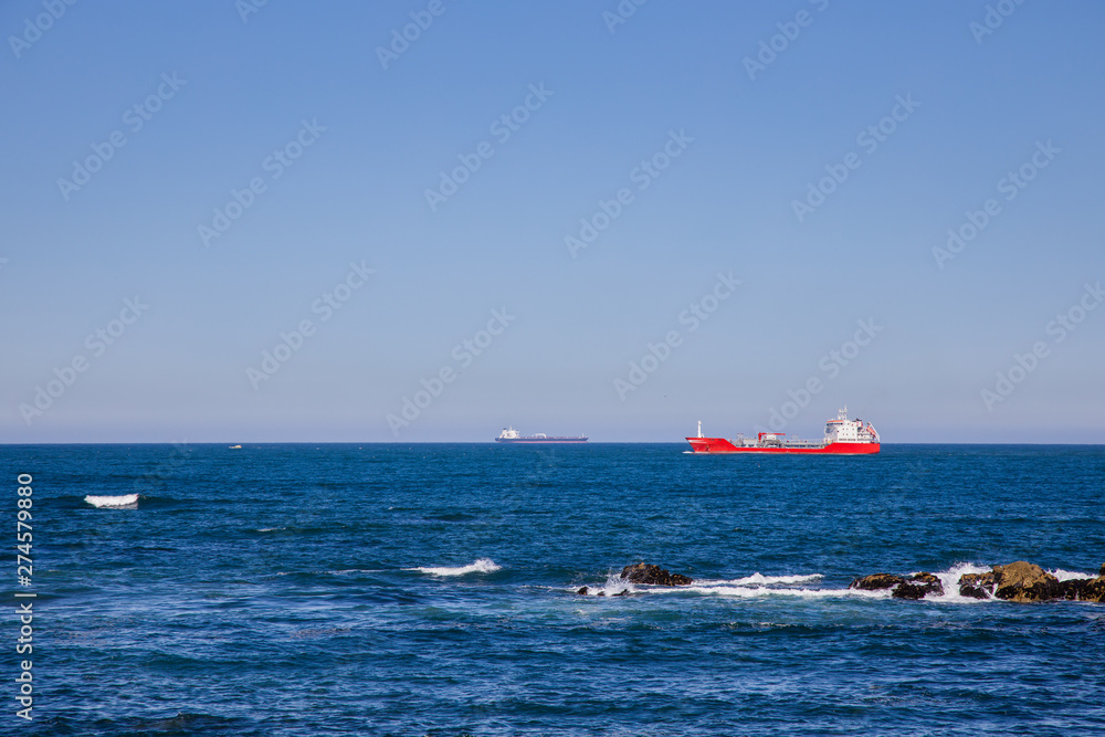 Scene on the ocean horizon at the coast of Porto, Portugal