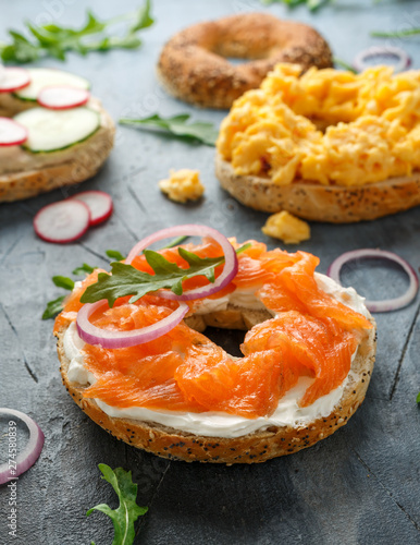 Healthy Bagels breakfast sandwich with salmon, scrambled eggs, vegetables and cream cheese