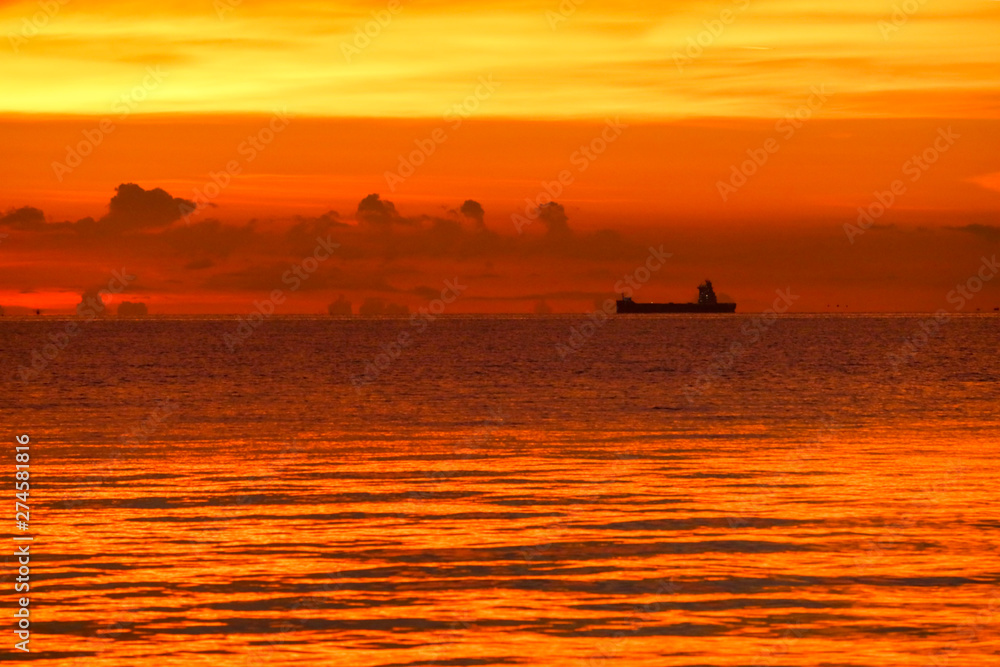 sunset on sea and ocean last light red sky silhouette cloud sunset on sea and ocean last light red sky silhouette cloud
