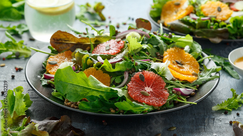 Orange and grapefruit Citrus salad with lentills vertes, wild rocket, arugula, red onion and sprinkle of pumpkin seeds