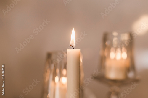 yellow light white candles and candles