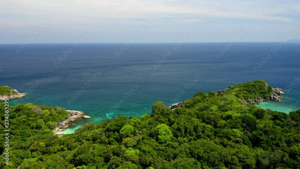 Aerial view from a drone of sea, sand, sun with clear beach and water at Cock Burn Island, Myanmar (Burma) Aerial view from a drone of sea, sand, sun with clear beach and water at Cock Burn Island, Myanmar (Burma)