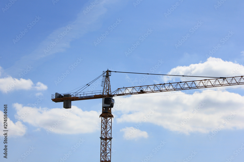Construction crane on empty sky background outdoors Construction crane on empty sky background outdoors