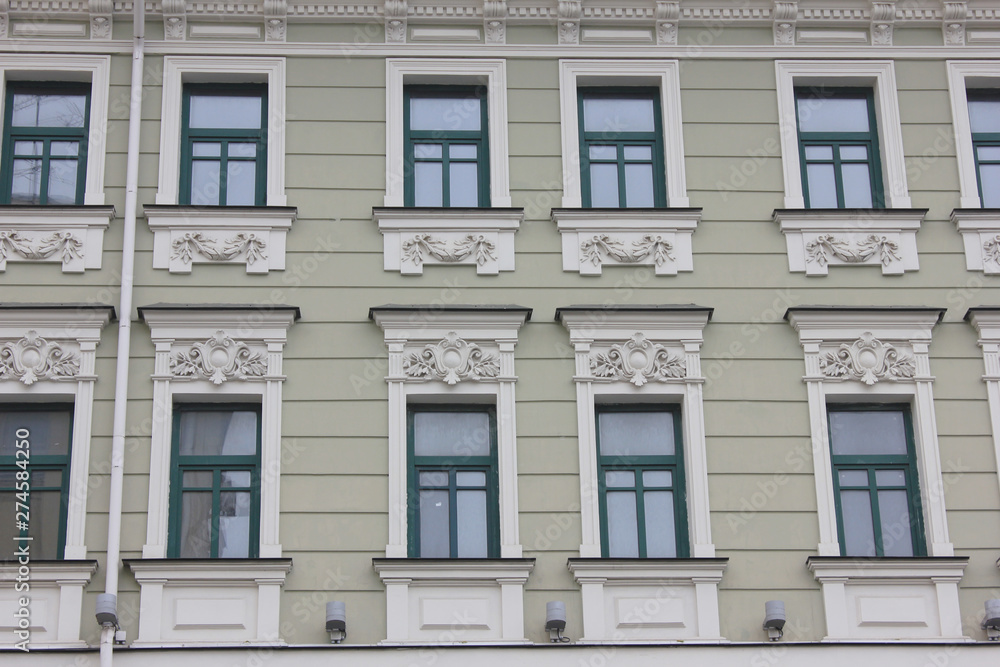 Fototapeta premium Historic old building facade close up of classic minimalist house exterior 