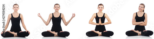 Young woman sitting cross-legged and doing yoga 