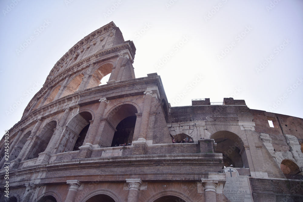 Rome ,Italy - June 2019 -  Colosseum in Rome. Colosseum is the most landmark in Rome. Huge Roman amphitheatre.