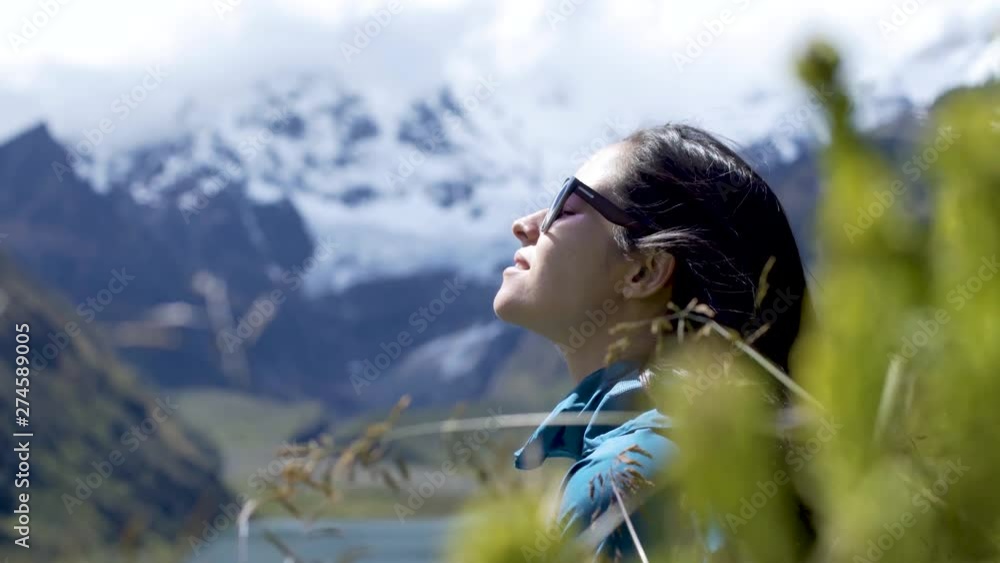 girl relax on the mountains enjoying sunslight sunny day on a beautiful scenary in Huayhuash Peru South America girl relax on the mountains enjoying sunslight sunny day on a beautiful scenary in Huayhuash Peru South America
