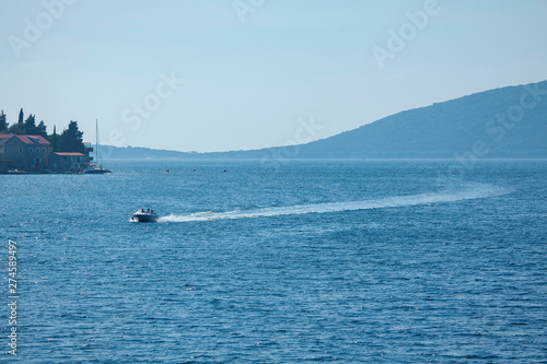 speeding motorboat on the blue sea