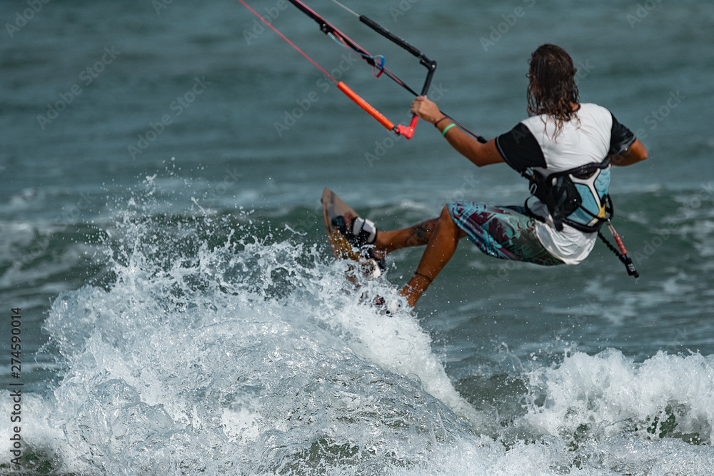 Naklejka premium Kitesurfer In Action