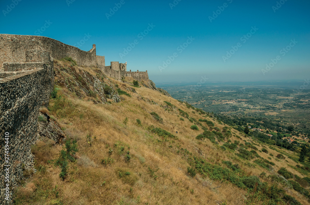 Walls and watchtowers over rocky ridge at the Marvao Castle