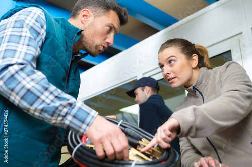 it engineers looking at cables