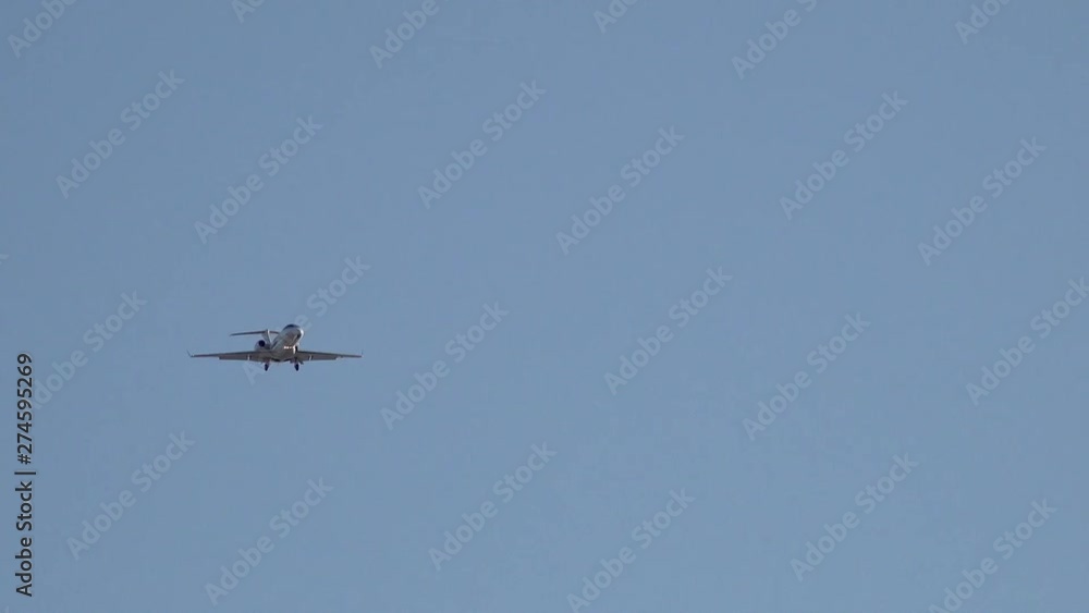 The plane is landing at Dallas-Fort Worth International Airport, Texas, on a summer evening. The plane is landing at Dallas-Fort Worth International Airport, Texas, on a summer evening.