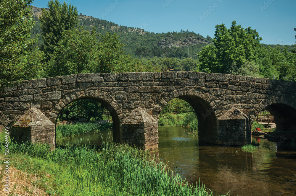 Old Roman stone bridge over the Sever River in Portagem