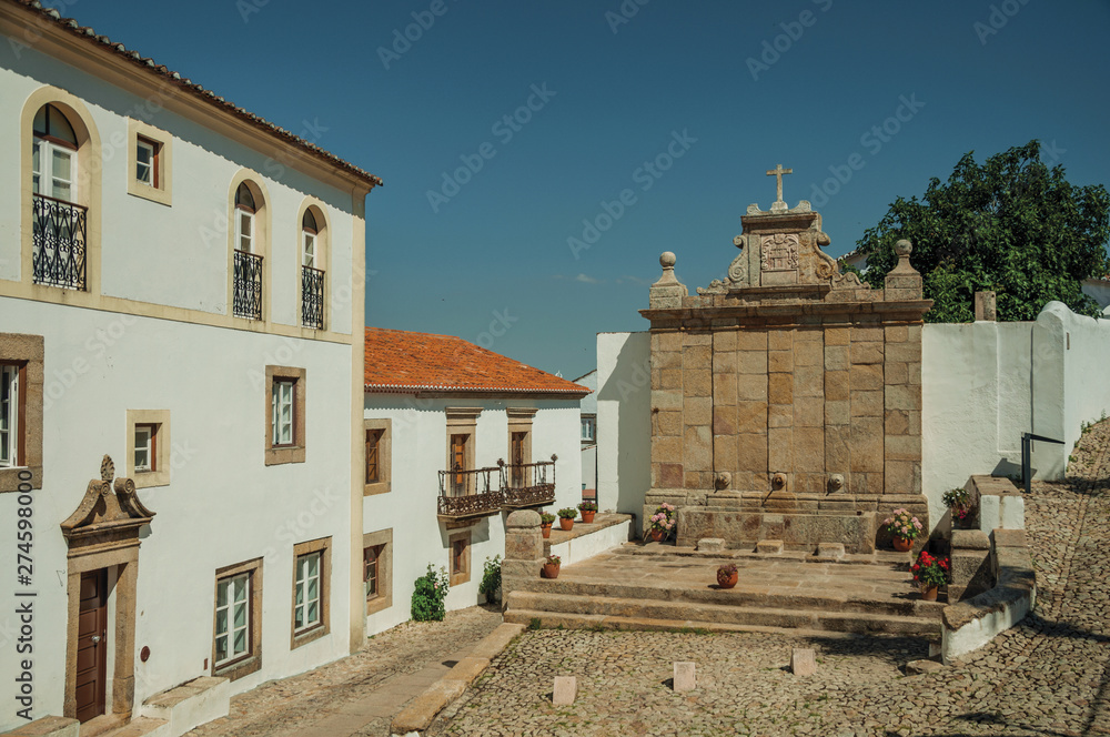 Old houses and stone fountain in baroque style st Marvao